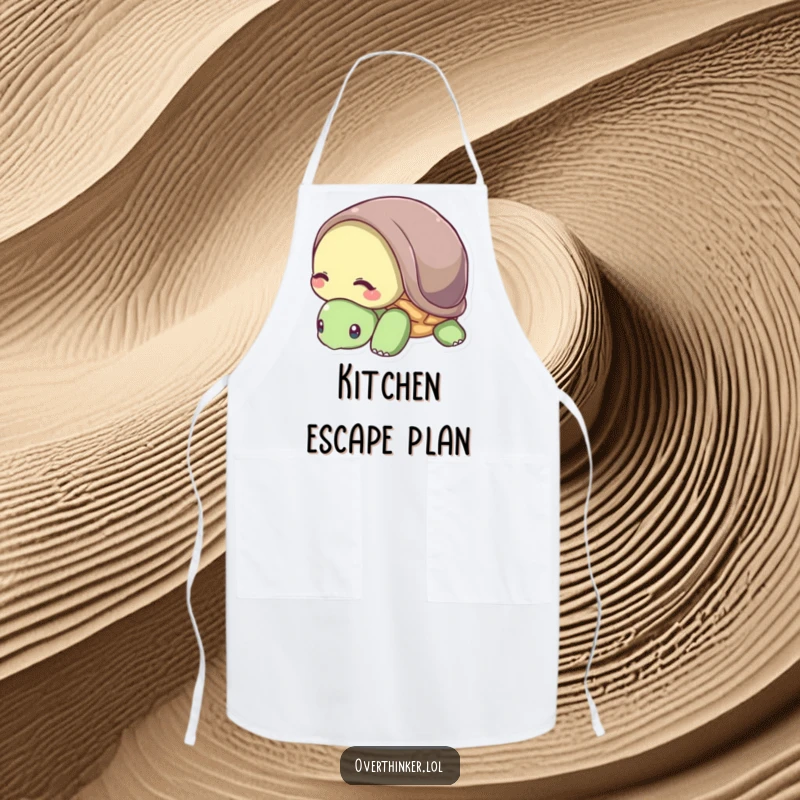 Funny apron showing a shy turtle hiding its head in its shell, suitable for a quiet kitchen.