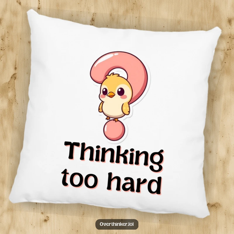 Funny pillow featuring a bird stuck in a question mark, offering cozy comfort and a touch of whimsical curiosity.