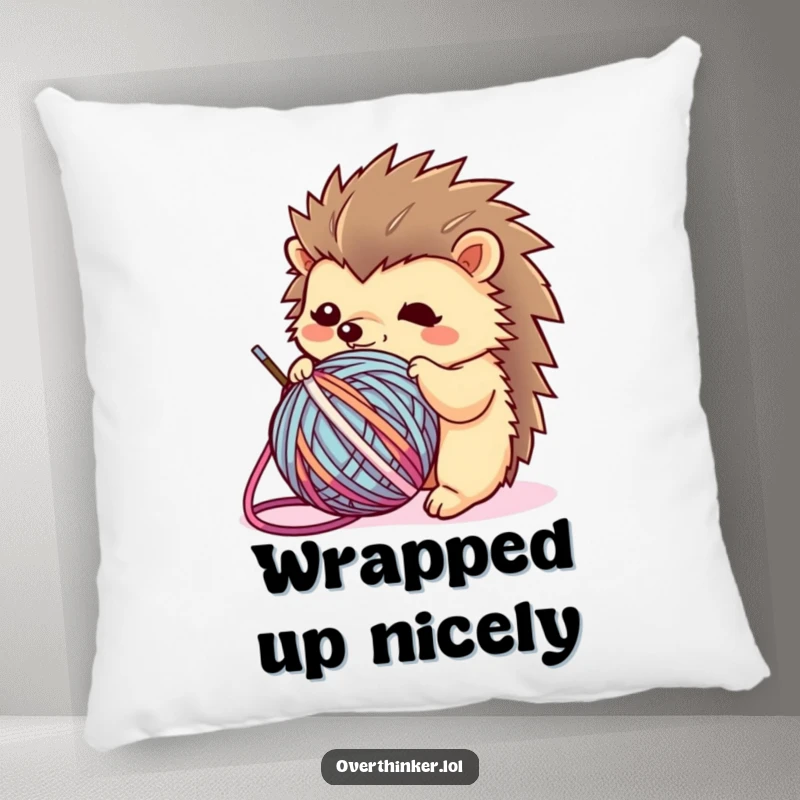 Funny Kawaii hedgehog pillow featuring a flustered character entwined with a ball of yarn, offering comfort and a humorous touch.
