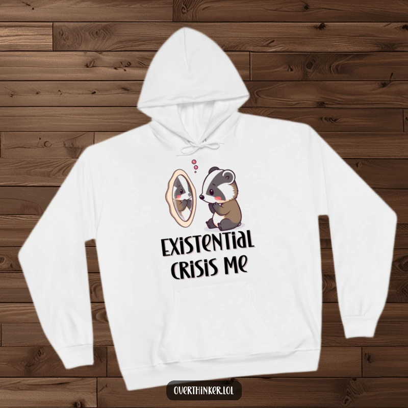 Funny hoodie featuring an overthinking badger staring at its reflection, lost in profound contemplation of its own being.