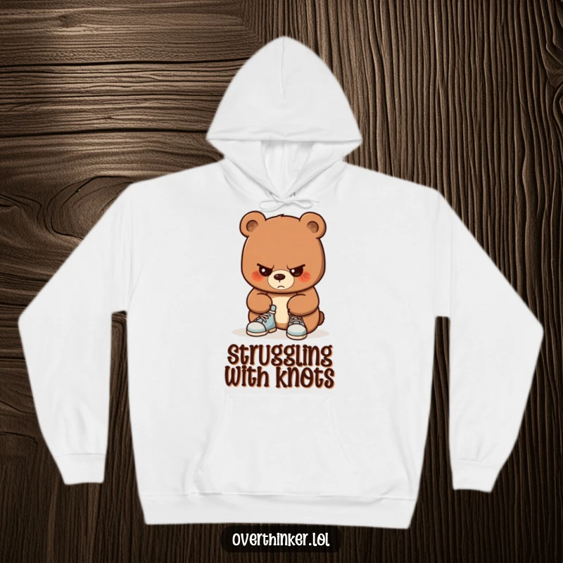 Funny hoodie featuring a bear with extreme focus on tying its shoelaces. Cozy and humorous for anyone working hard on a task.