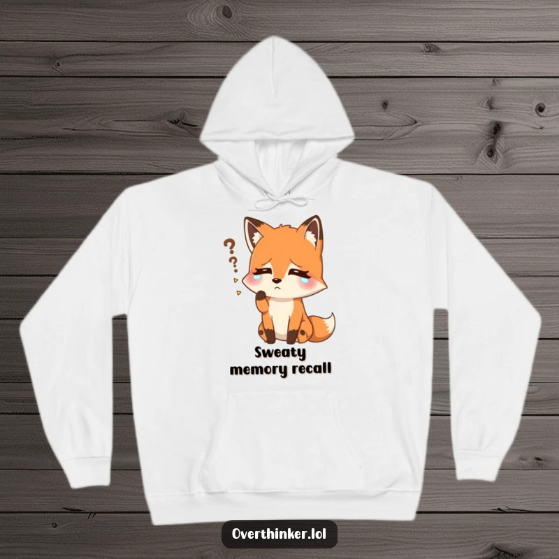 Funny hoodie featuring a fox sweating profusely, trying hard to recall a forgotten name. Cozy and humorous for anyone with a bad memory.