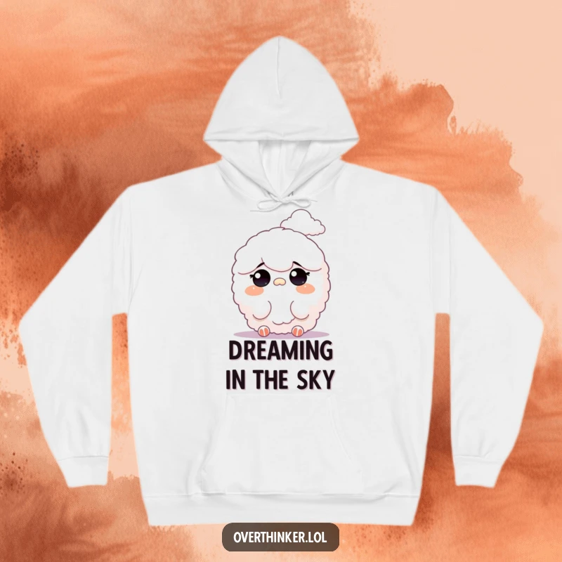 Funny hoodie illustration of a fluffy character squinting at a faint, distant cloud formation, embodying peaceful contemplation.