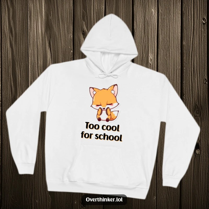 Funny hoodie illustrating a fox character burying its face in its paws, symbolizing deep embarrassment and a touch of playful shame.