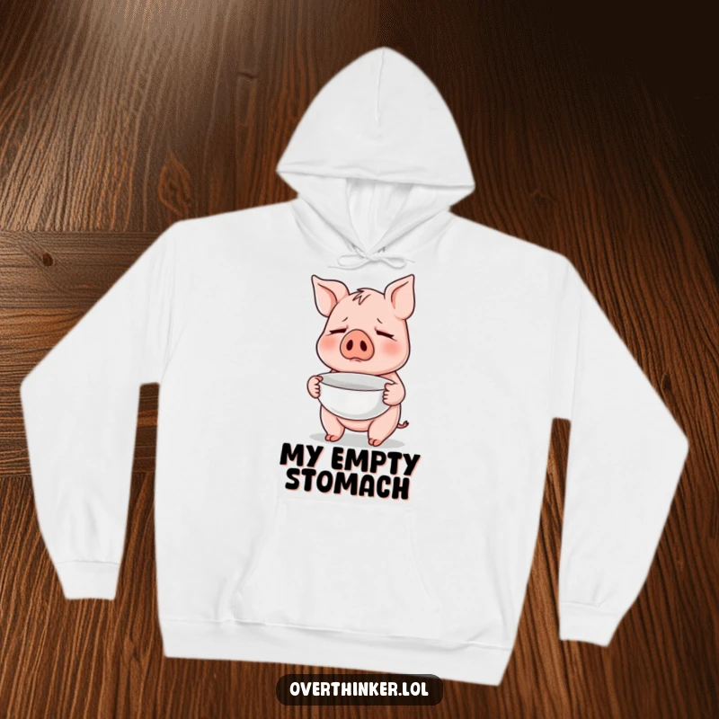 Funny hoodie featuring a pig nervously holding an empty bowl, representing a relatable desire for food and comfort.