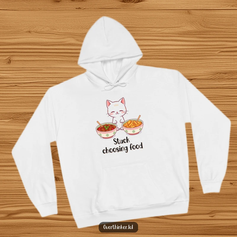 Funny Kawaii cat hoodie showing a cute cat looking back and forth between two identical food bowls, perfect for cozy and humorous wear.