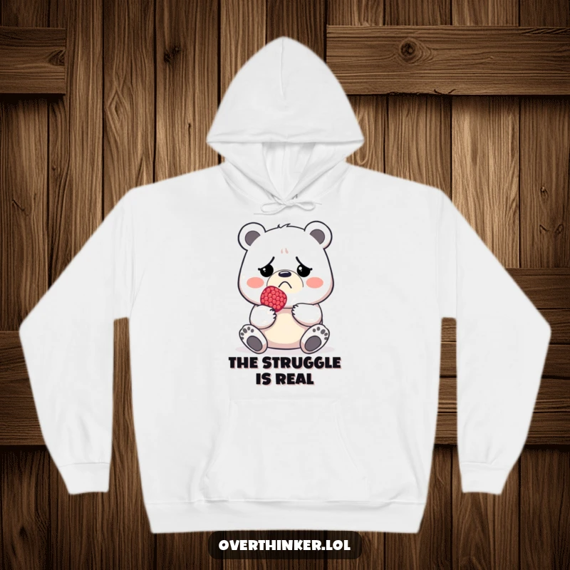 Funny and warm hoodie with a frowning bear holding a tiny berry, perfect for chilly days.