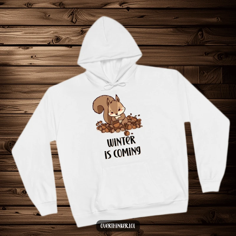 Funny Squirrel Hoodie depicting a squirrel frantically burying an excessive amount of acorns, a humorous garment.