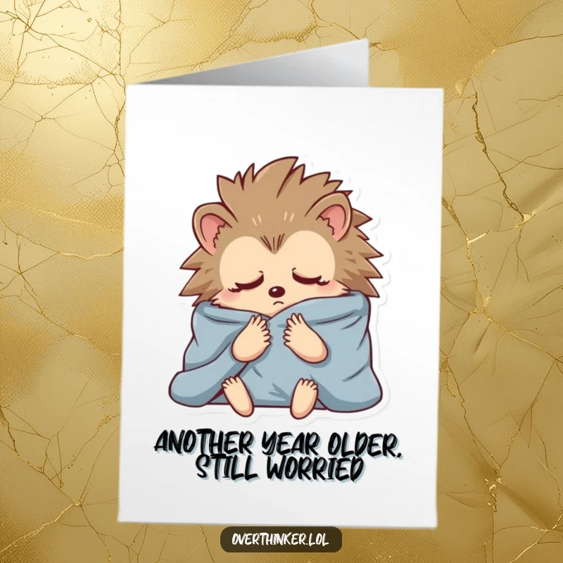 Funny Free Printable Birthday Card: anxious hedgehog wrapped in blankets, contemplating life, adding humor to greetings.