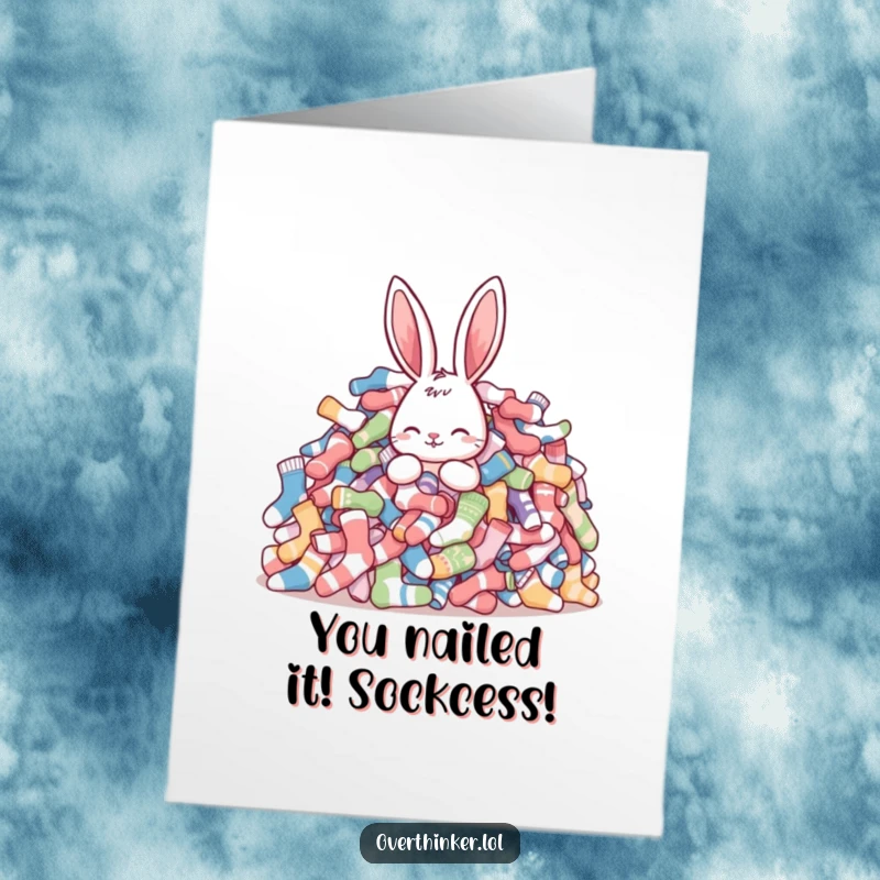 Funny Free Printable Congrats Card: Rabbit triumphantly holding a single sock, pile of mismatches behind. Hilarious downloadable art.