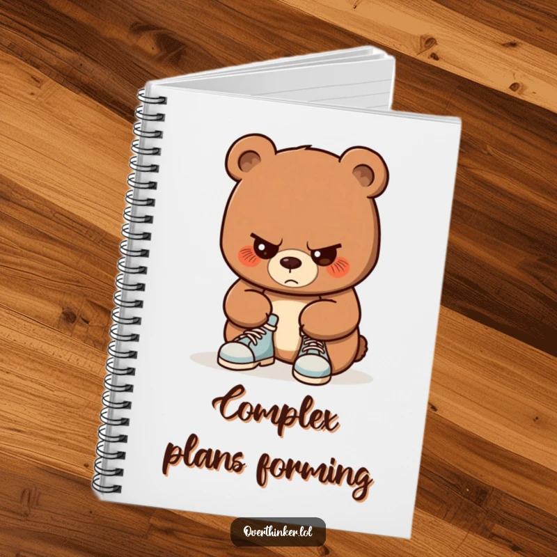 Funny notebook with a bear concentrating hard on tying its shoelaces. Ideal for notes, journaling, and planning your next big task.