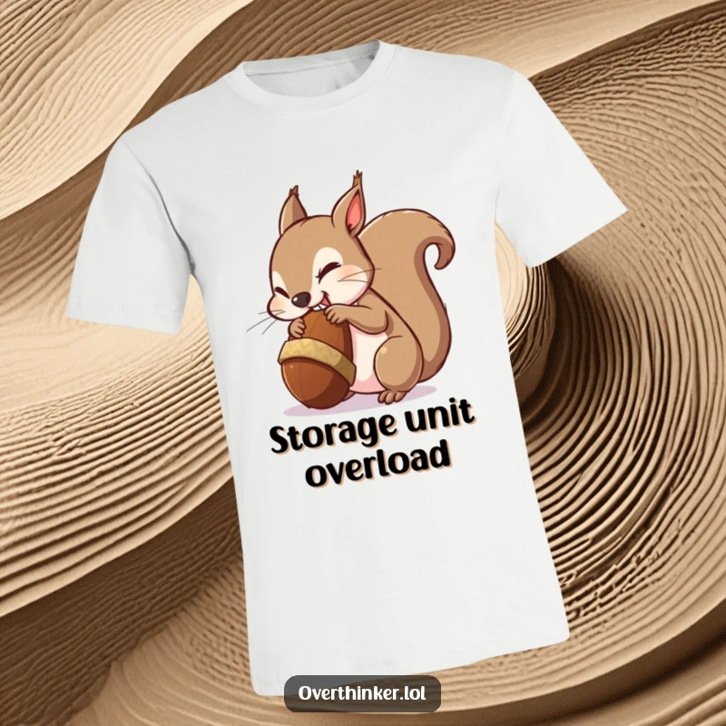 Funny t-shirt graphic of a squirrel with wide, panicked eyes nervously chewing a ridiculously oversized acorn.